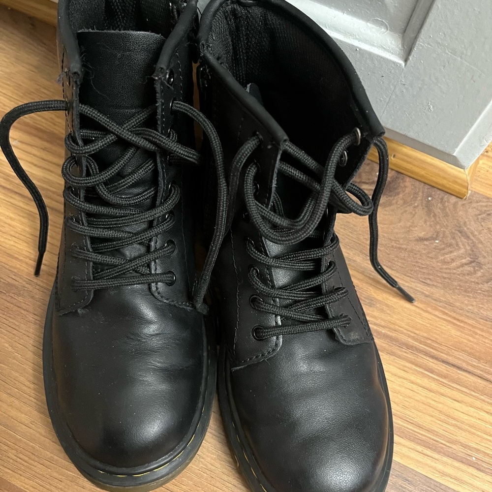 Classic Dr Martens black, youth size 4. Excellent used condition.